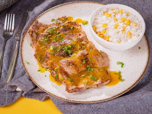 Chuletas de cerdo en salsa de naranja y curry